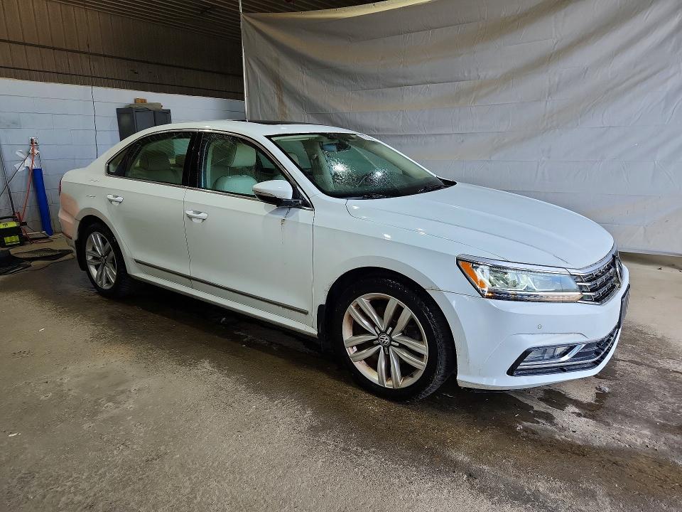 Photo 4 from auction – 2017 VOLKSWAGEN PASSAT with VIN 1VWGT7A35HC009372