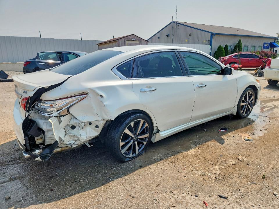 Photo 3 from auction – 2016 NISSAN ALTIMA with VIN 1N4AL3AP9GC180537