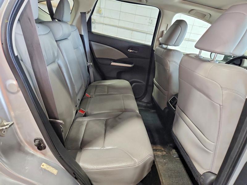 Photo 11 from auction – 2015 HONDA CR-V with VIN 2HKRM4H7XFH617390