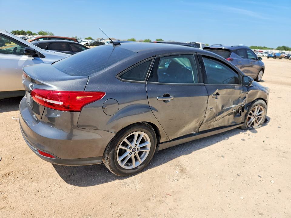 Photo 3 from auction – 2016 FORD FOCUS with VIN 1FADP3F28GL369209