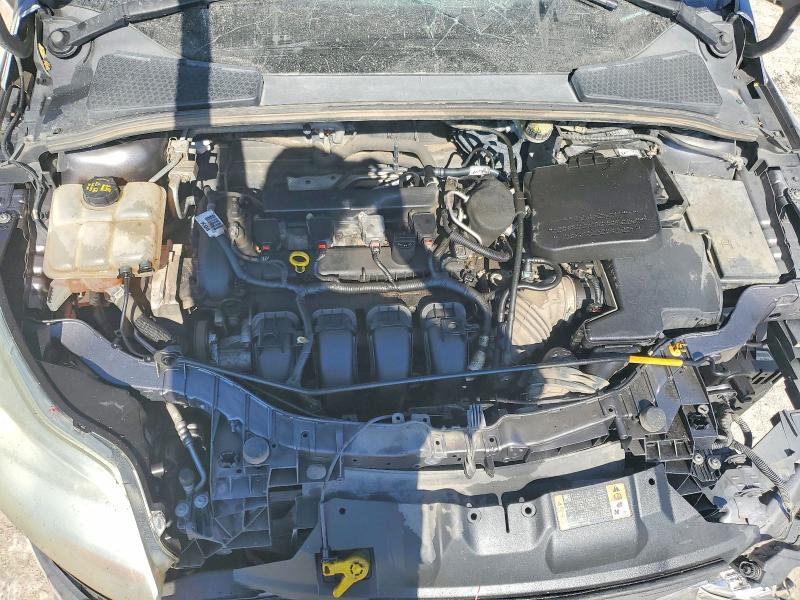 Photo 11 from auction – 2014 FORD FOCUS with VIN 1FADP3F2XEL390592