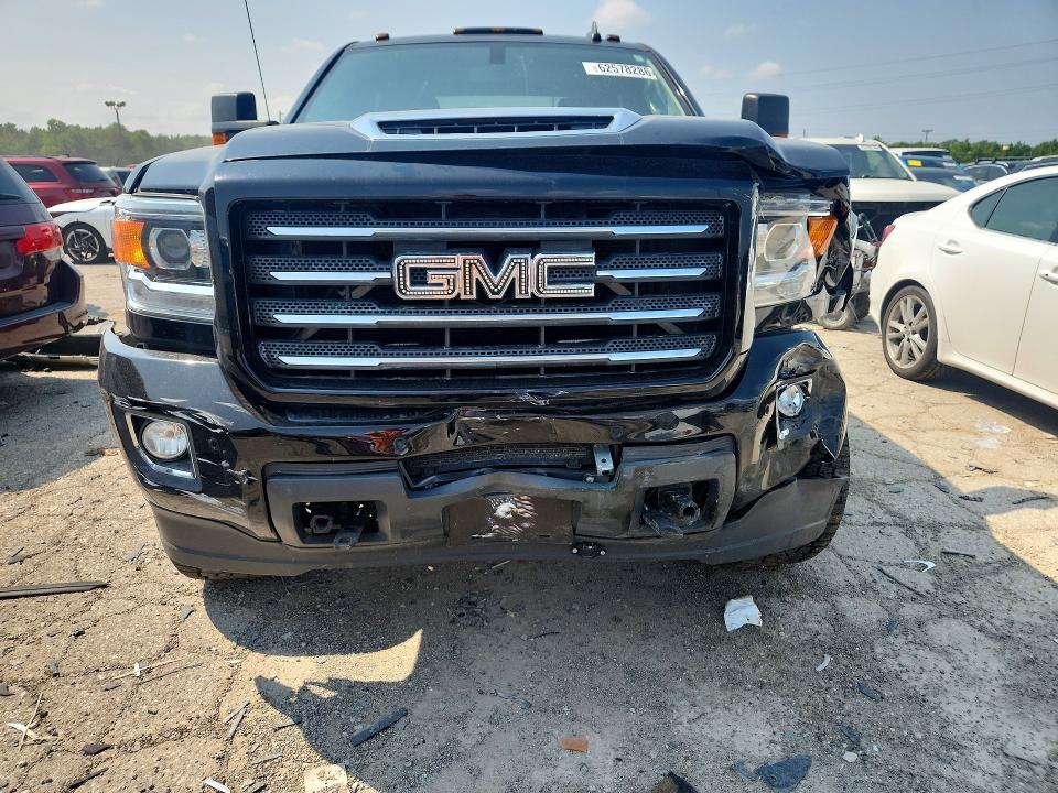 Photo 5 from auction – 2018 GMC SIERRA with VIN 1GT12TEY3JF254377