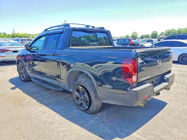 Photo 2 from auction – 2023 HONDA RIDGELINE with VIN 5FPYK3F88PB021581