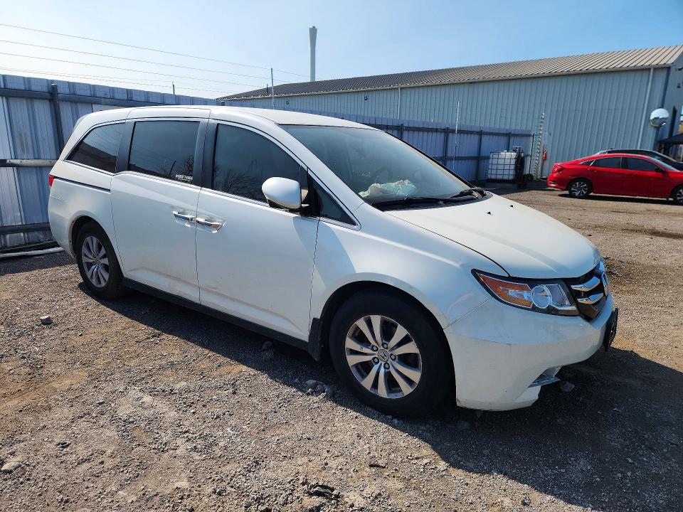 Photo 4 from auction – 2014 HONDA ODYSSEY with VIN 5FNRL5H48EB503769