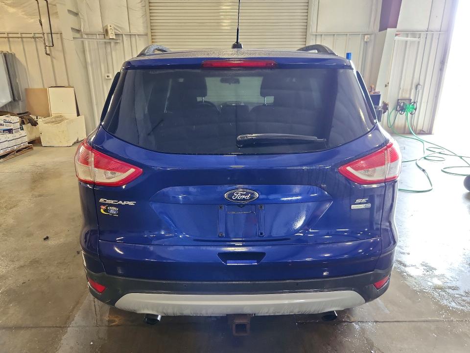 Photo 6 from auction – 2014 FORD ESCAPE with VIN 1FMCU9G96EUB72491