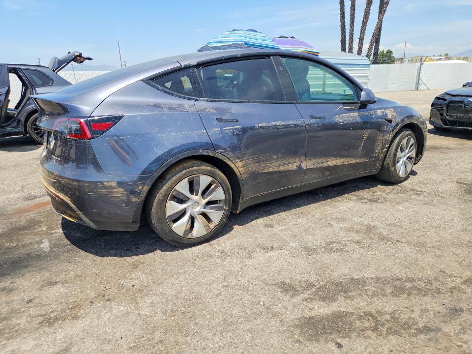 Photo 3 from auction – 2023 TESLA MODEL Y with VIN 7SAYGDEEXPF909985