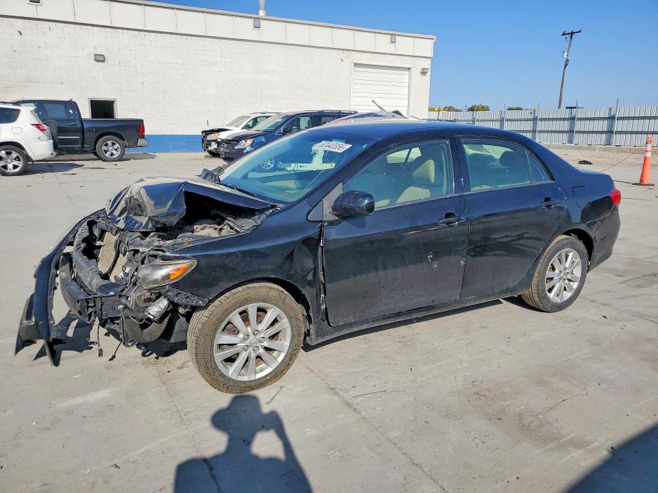TOYOTA COROLLA 2009 with VIN 1NXBU40E69Z014518 - Photo from auction