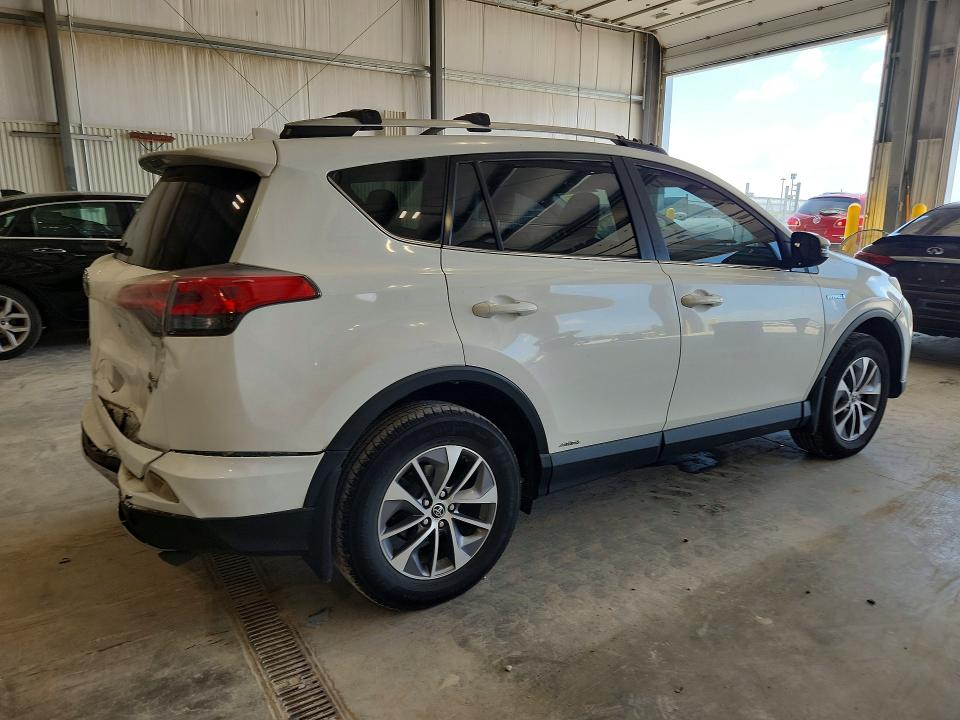 Photo 3 from auction – 2016 TOYOTA RAV4 HV with VIN JTMRJREV8GD033585