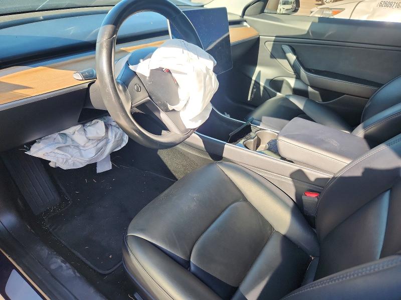 Снимка 8 от търг – 2018 TESLA MODEL 3 с VIN 5YJ3E1EA9JF102597