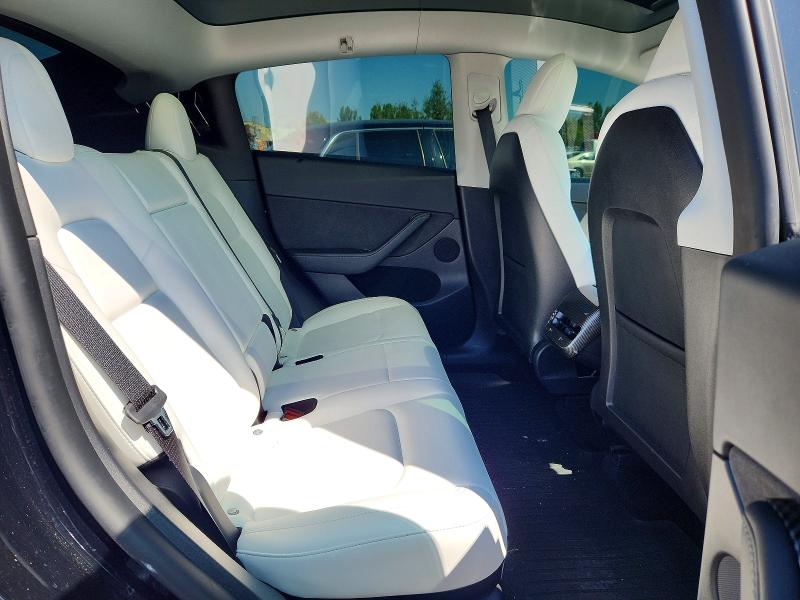 Photo 11 from auction – 2022 TESLA MODEL Y with VIN 7SAYGDEF7NF524079
