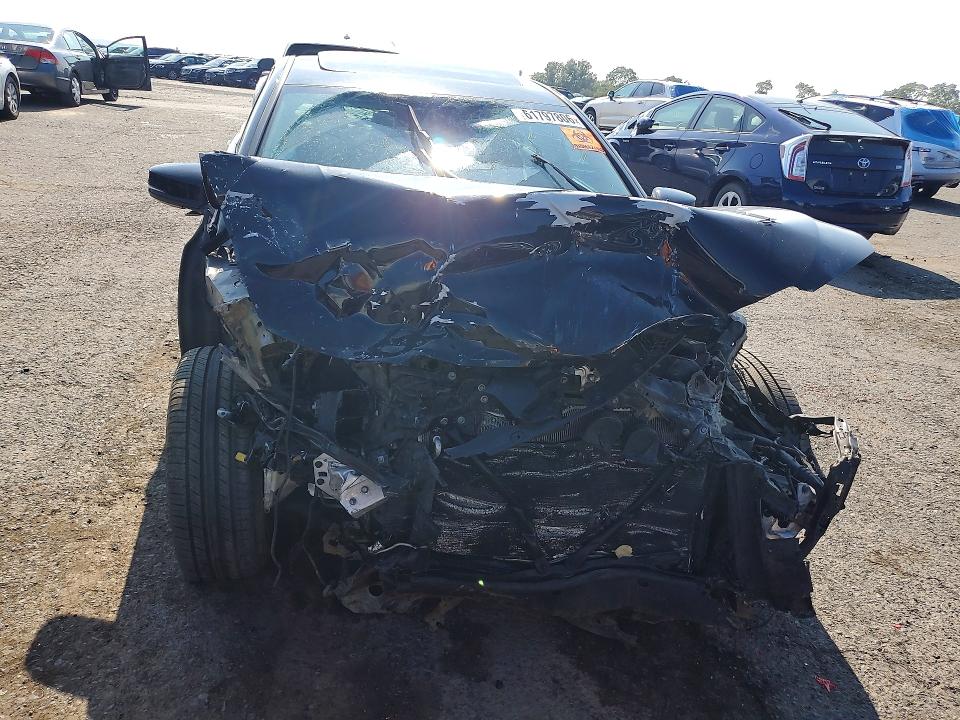Photo 5 from auction – 2015 ACURA TLX with VIN 19UUB3F75FA010156