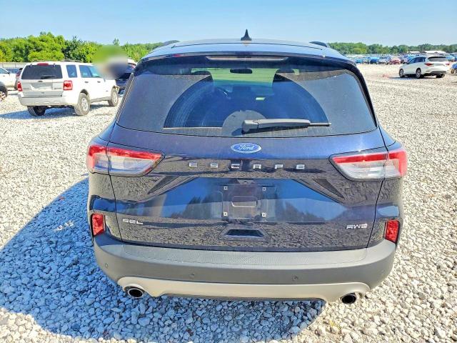 Photo 6 from auction – 2021 FORD ESCAPE with VIN 1FMCU9H66MUA92644