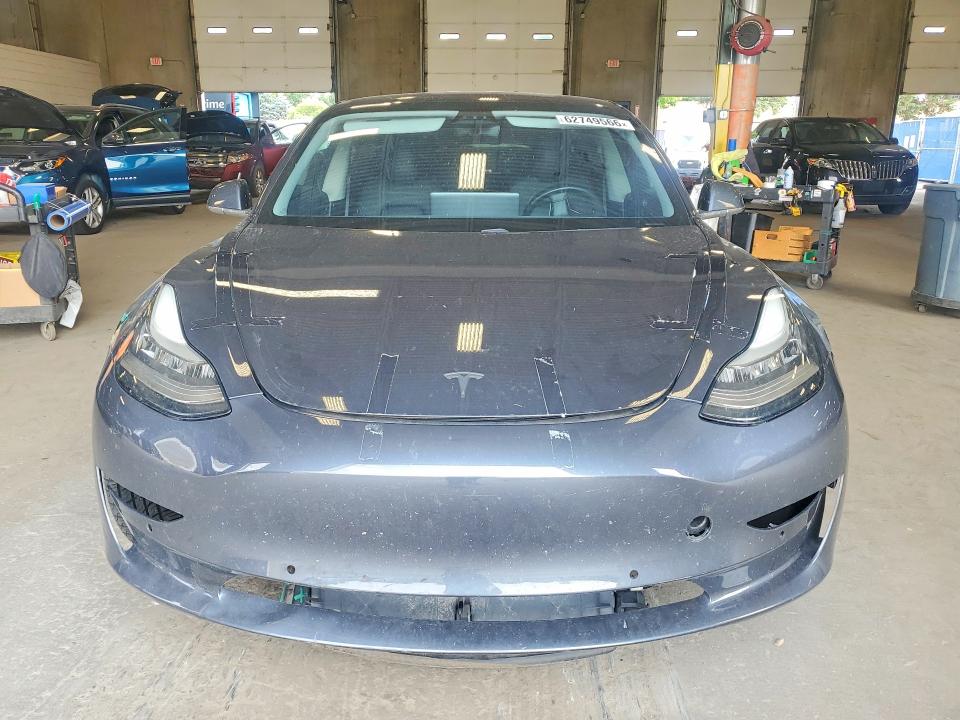 Foto 5 de la subasta – 2018 TESLA MODEL 3 con VIN 5YJ3E1EB9JF076978