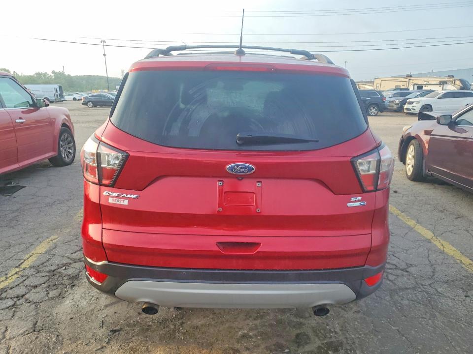 Photo 6 from auction – 2017 FORD ESCAPE with VIN 1FMCU9GD2HUC63654