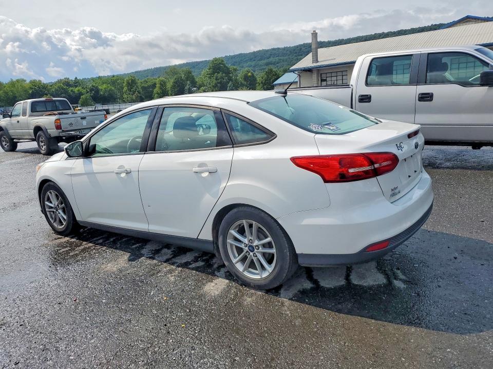 Photo 2 from auction – 2015 FORD FOCUS with VIN 1FADP3F28FL353610