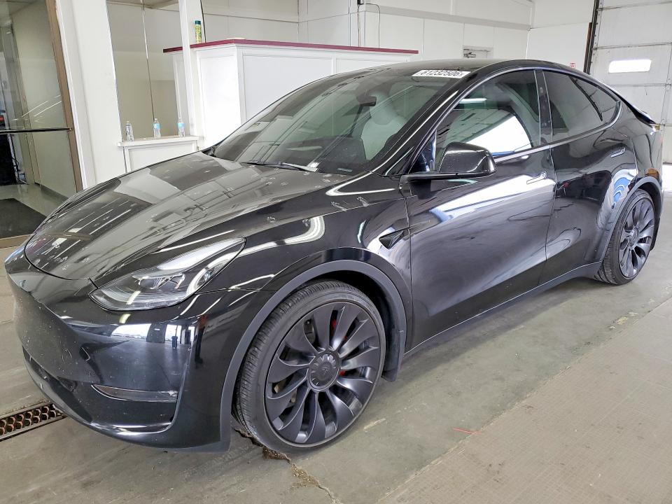 TESLA MODEL Y 2024 with VIN 7SAYGDEF7RF087397 - Photo from auction