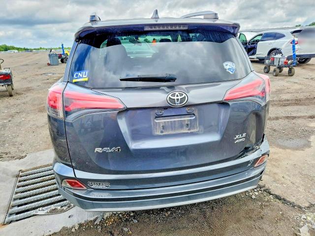 Photo 6 from auction – 2016 TOYOTA RAV4 with VIN JTMRFREV7GD193877