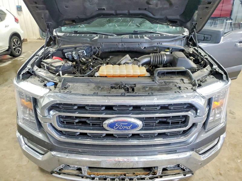 Photo 11 from auction – 2021 FORD F150 with VIN 1FTFW1E51MKE28477