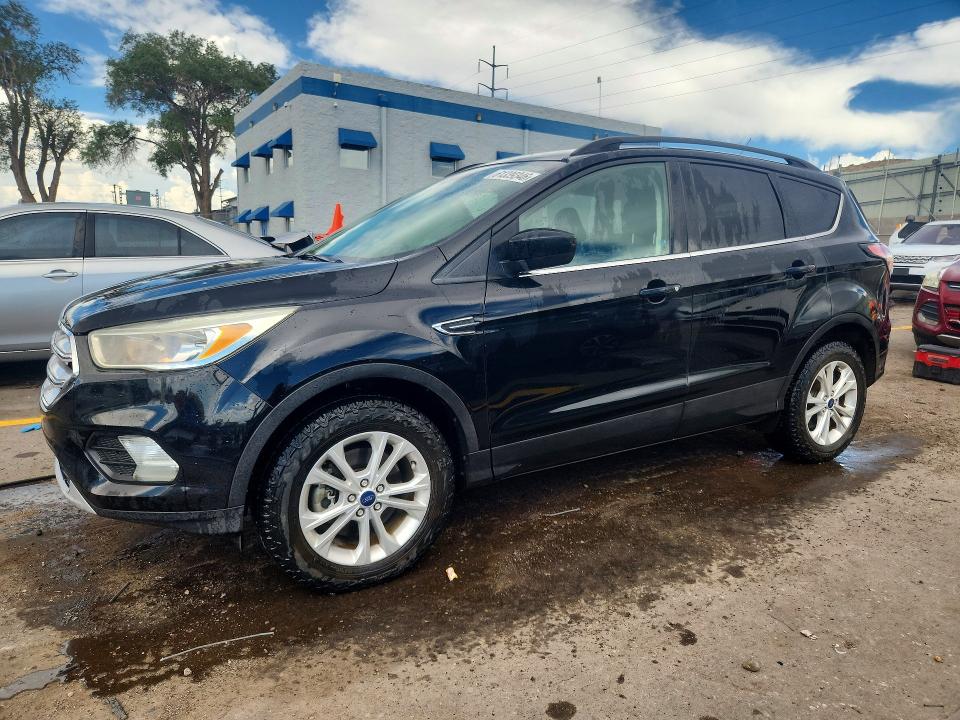 FORD ESCAPE 2018 with VIN 1FMCU9GD2JUA32064 - Photo from auction