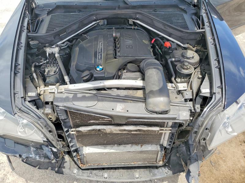 Photo 12 from auction – 2013 BMW X5 with VIN 5UXZV4C52D0B09073