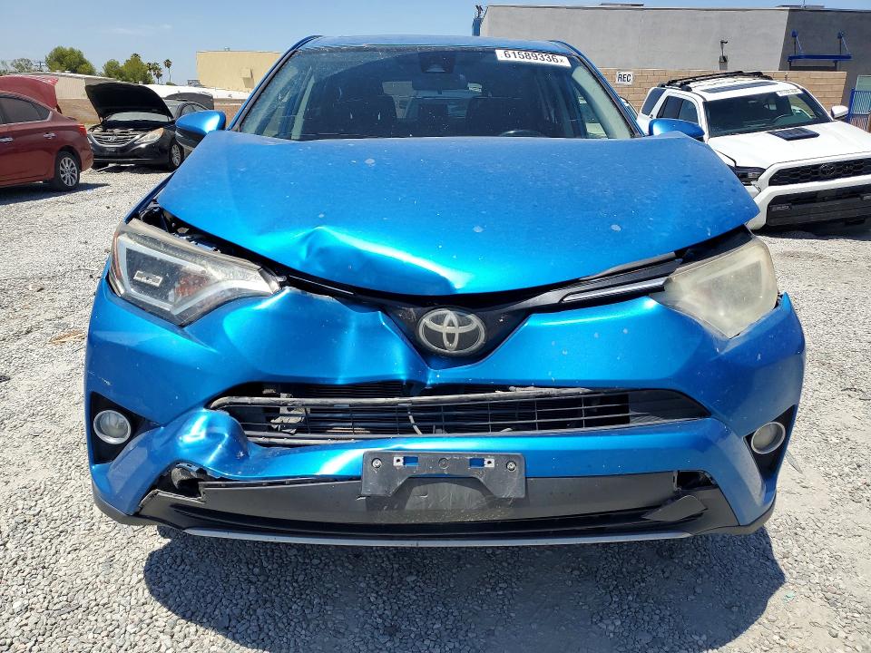 Photo 5 from auction – 2018 TOYOTA RAV4 with VIN JTMWFREV0JJ193229