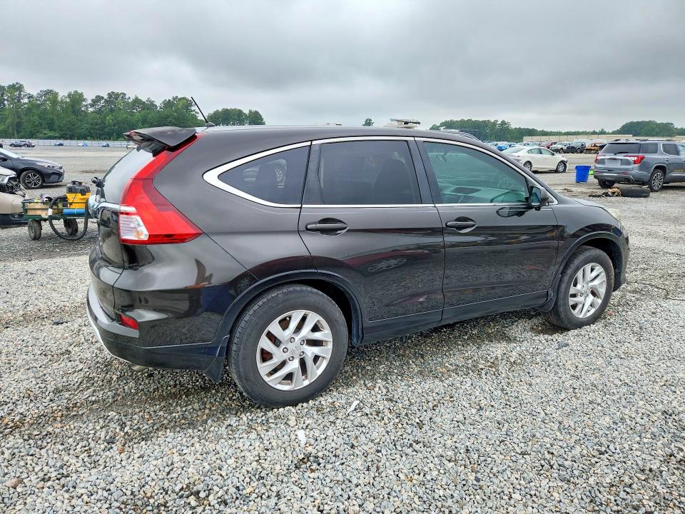 Photo 3 from auction – 2015 HONDA CR-V with VIN 2HKRM3H54FH551623