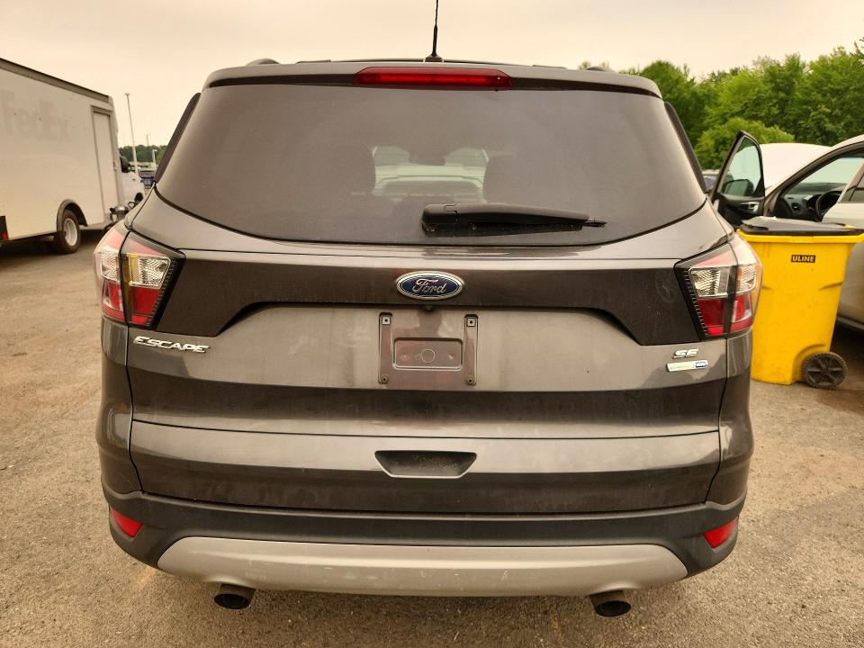 Photo 6 from auction – 2018 FORD ESCAPE with VIN 1FMCU9GD0JUC98408