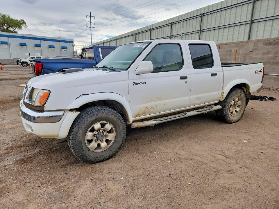 NISSAN FRONTIER 2000 with VIN 1N6ED27Y3YC338677 - Photo from auction