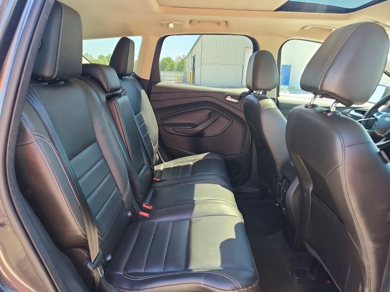 Photo 11 from auction – 2016 FORD ESCAPE with VIN 1FMCU9J98GUA82142