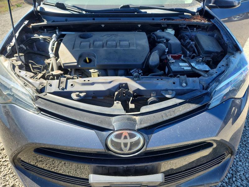 Photo 11 from auction – 2018 TOYOTA COROLLA with VIN 5YFBURHE9JP749677