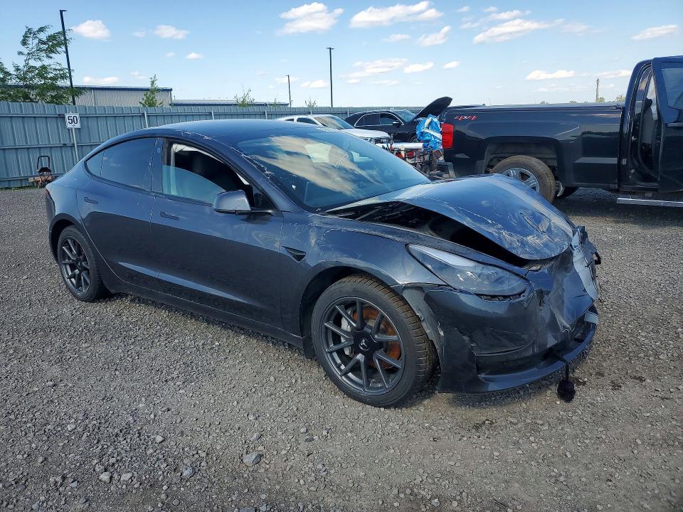 Photo 4 from auction – 2023 TESLA MODEL 3 with VIN 5YJ3E1EA9PF407106