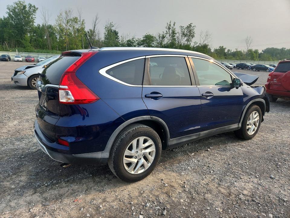 Photo 3 from auction – 2016 HONDA CR-V with VIN 5J6RM3H70GL021111