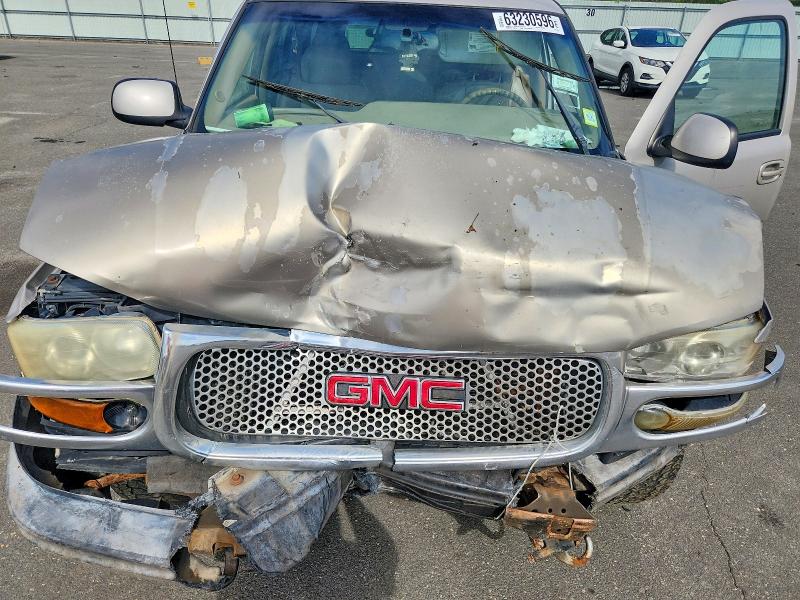 Photo 12 from auction – 2004 GMC YUKON XL with VIN 1GKFK66U84J238569