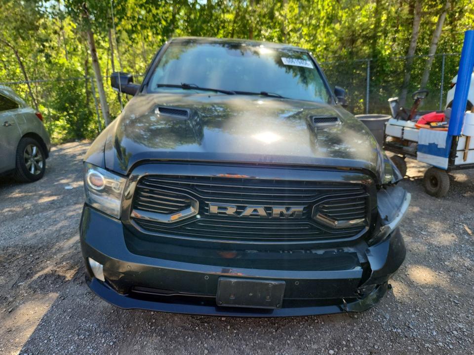 Photo 5 from auction – 2018 RAM 1500 with VIN 1C6RR7MT6JS143929