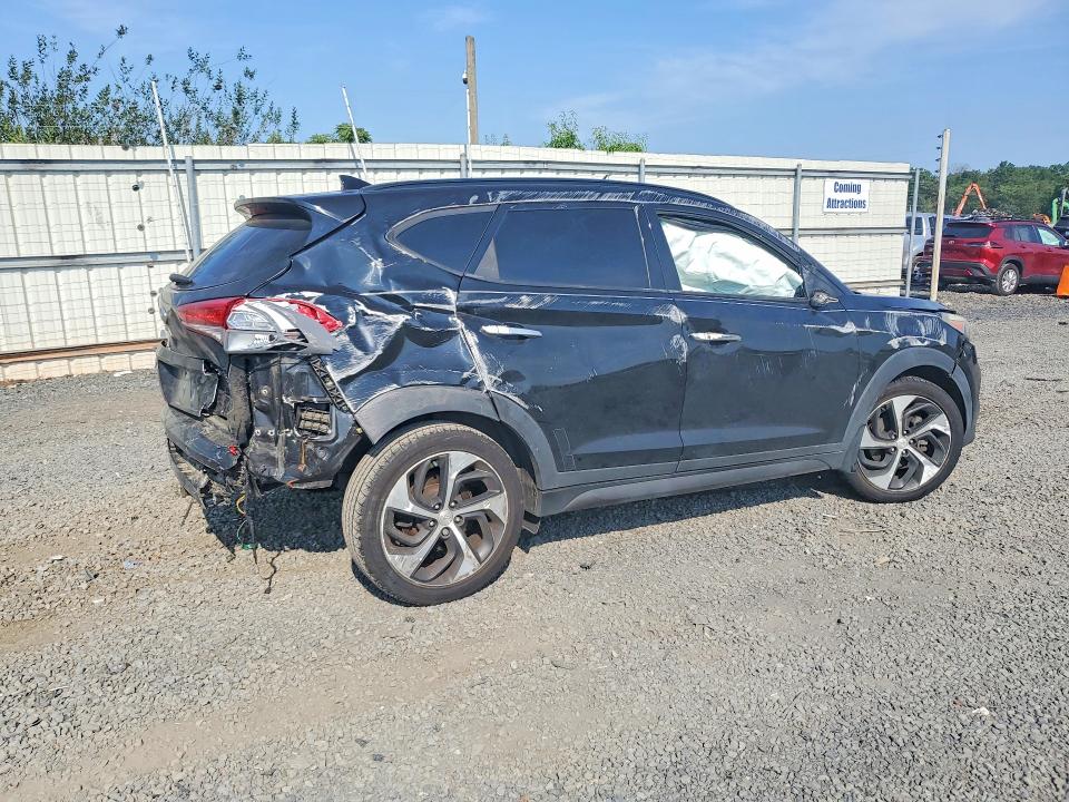 Photo 3 from auction – 2016 HYUNDAI TUCSON with VIN KM8J3CA27GU059042