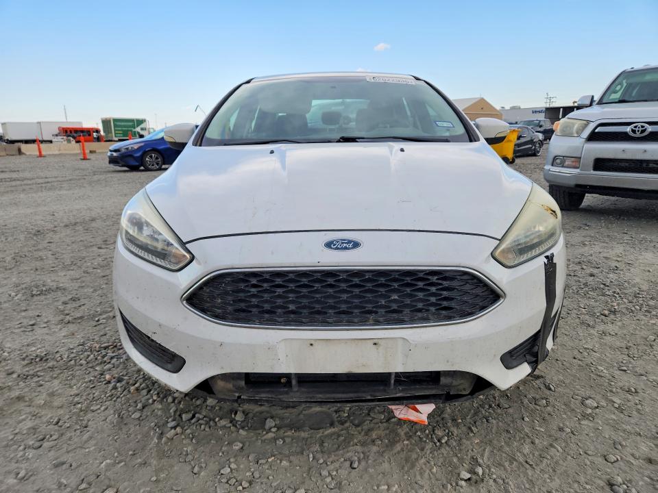 Photo 5 from auction – 2016 FORD FOCUS with VIN 1FADP3F26GL233953