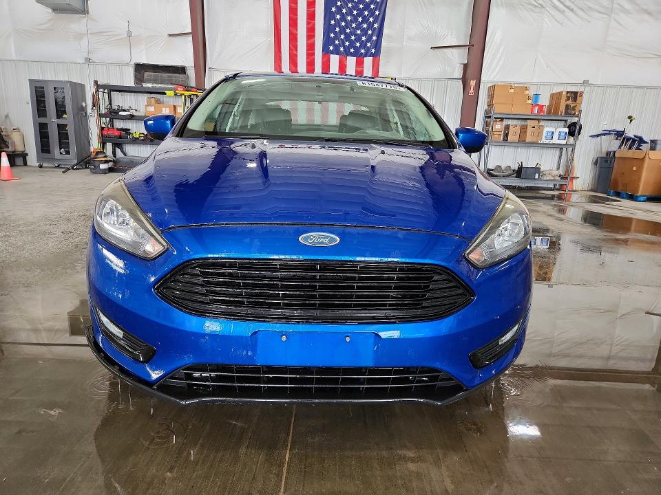 Photo 5 from auction – 2018 FORD FOCUS with VIN 1FADP3F27JL211158