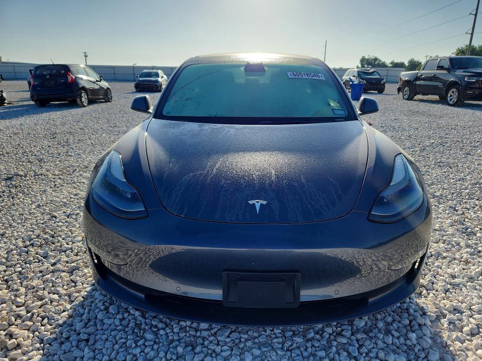 Photo 5 from auction – 2022 TESLA MODEL 3 with VIN 5YJ3E1EA3NF167967