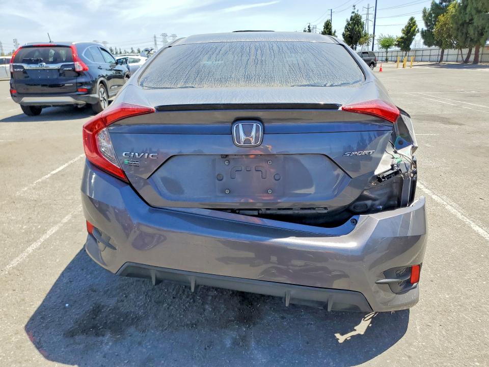 Photo 6 from auction – 2021 HONDA CIVIC with VIN 2HGFC2F83MH548104