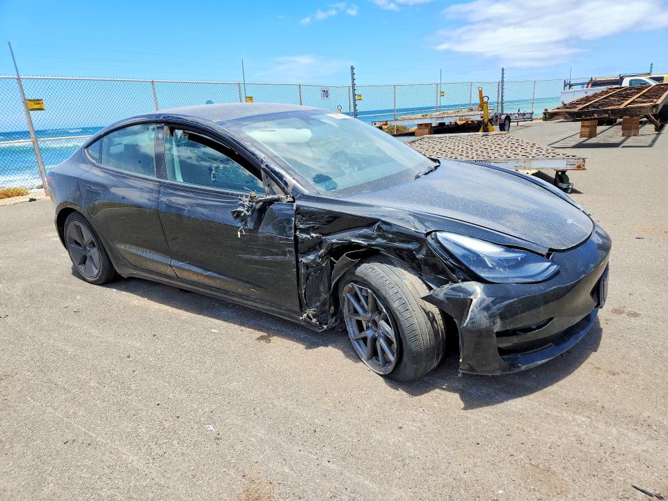 Photo 4 from auction – 2023 TESLA MODEL 3 with VIN 5YJ3E1EA3PF431692