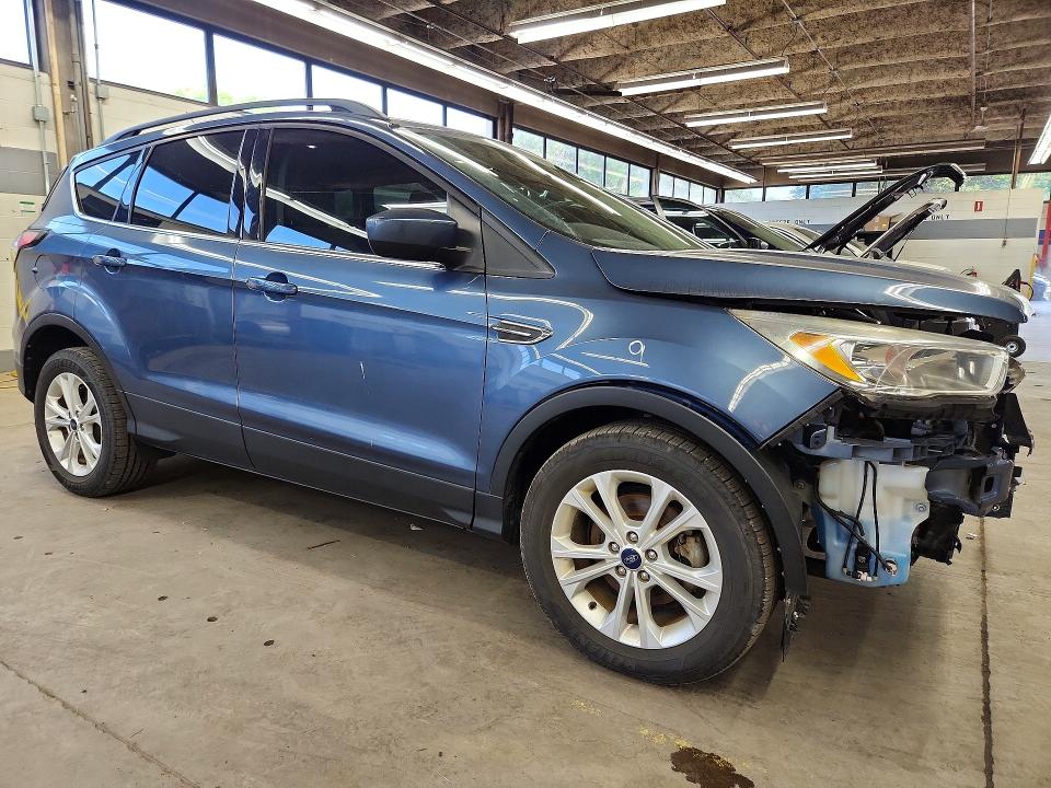 Photo 4 from auction – 2018 FORD ESCAPE with VIN 1FMCU0GD8JUA03857