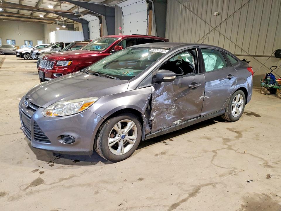 FORD FOCUS 2014 with VIN 1FADP3F21EL160360 - Photo from auction