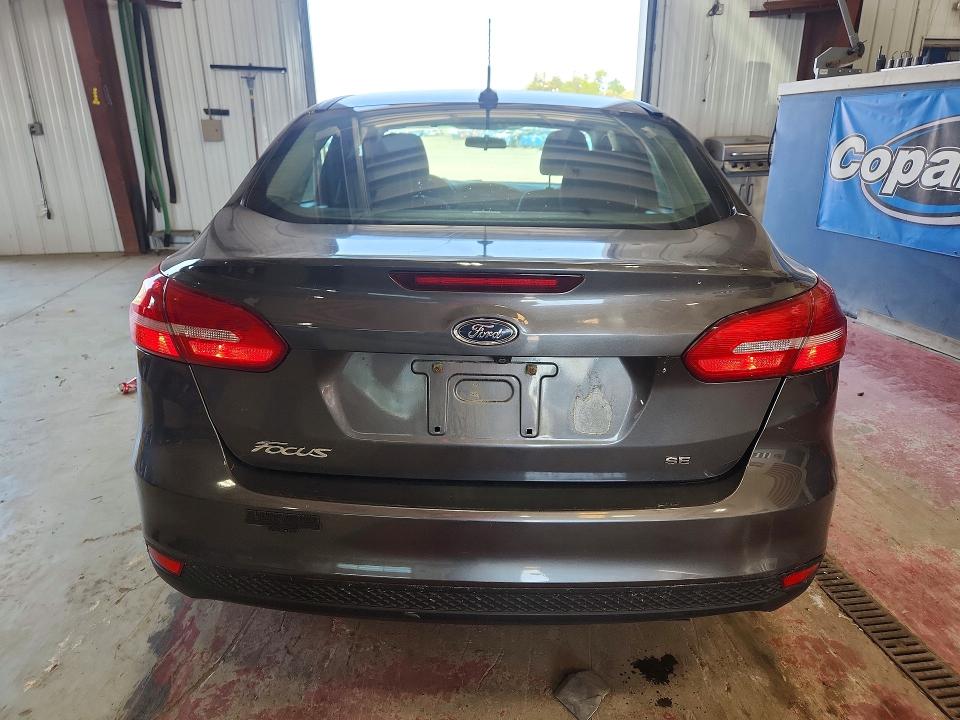 Photo 6 from auction – 2015 FORD FOCUS with VIN 1FADP3F21FL237827