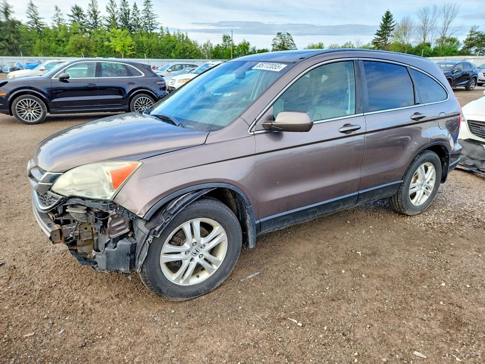 HONDA CR-V 2011 with VIN 5J6RE4H79BL806111 - Photo from auction