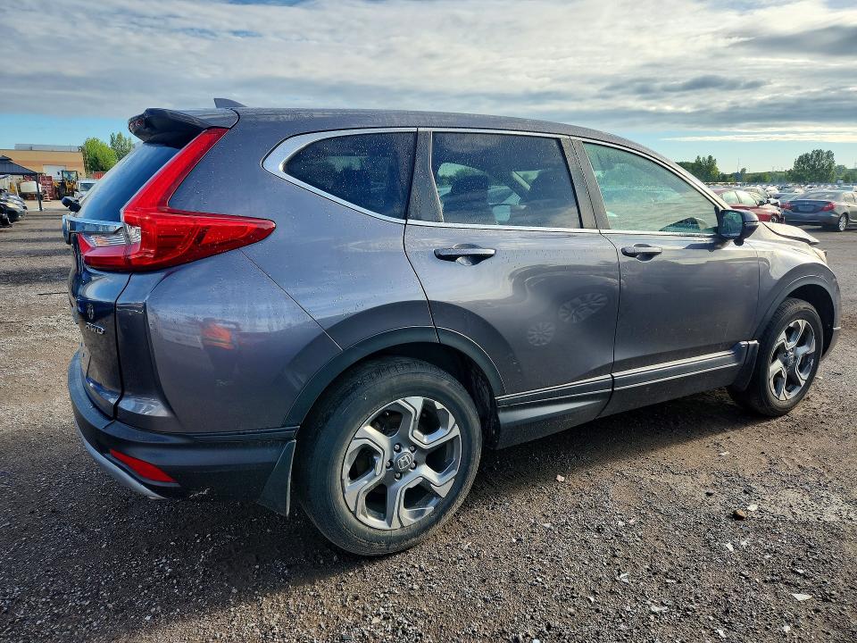 Photo 3 from auction – 2018 HONDA CR-V with VIN 2HKRW2H83JH114283