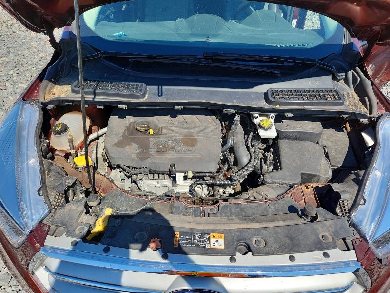 Photo 11 from auction – 2018 FORD ESCAPE with VIN 1FMCU9GD0JUC74190