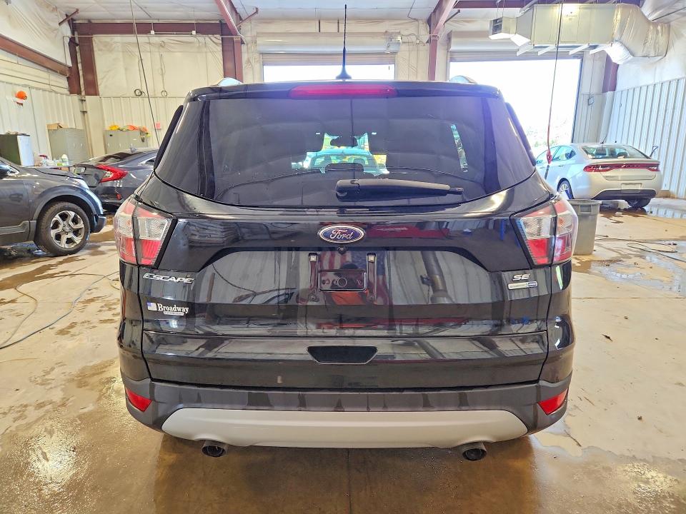 Photo 6 from auction – 2018 FORD ESCAPE with VIN 1FMCU9GD4JUC18236