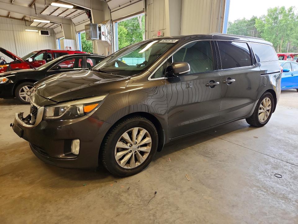 KIA SEDONA 2015 with VIN KNDMC5C19F6033076 - Photo from auction