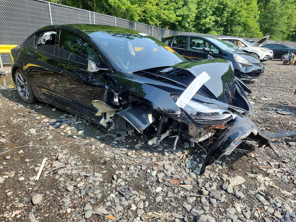Photo 4 from auction – 2023 TESLA MODEL 3 with VIN 5YJ3E1EA3PF502051