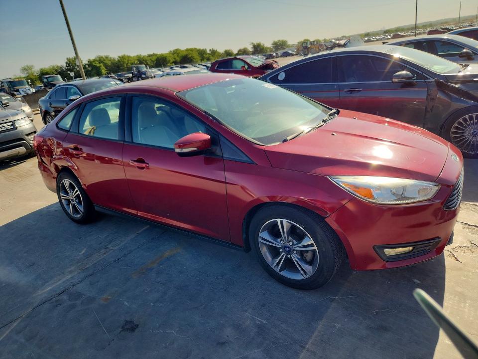 Photo 4 from auction – 2016 FORD FOCUS with VIN 1FADP3FE0GL225096